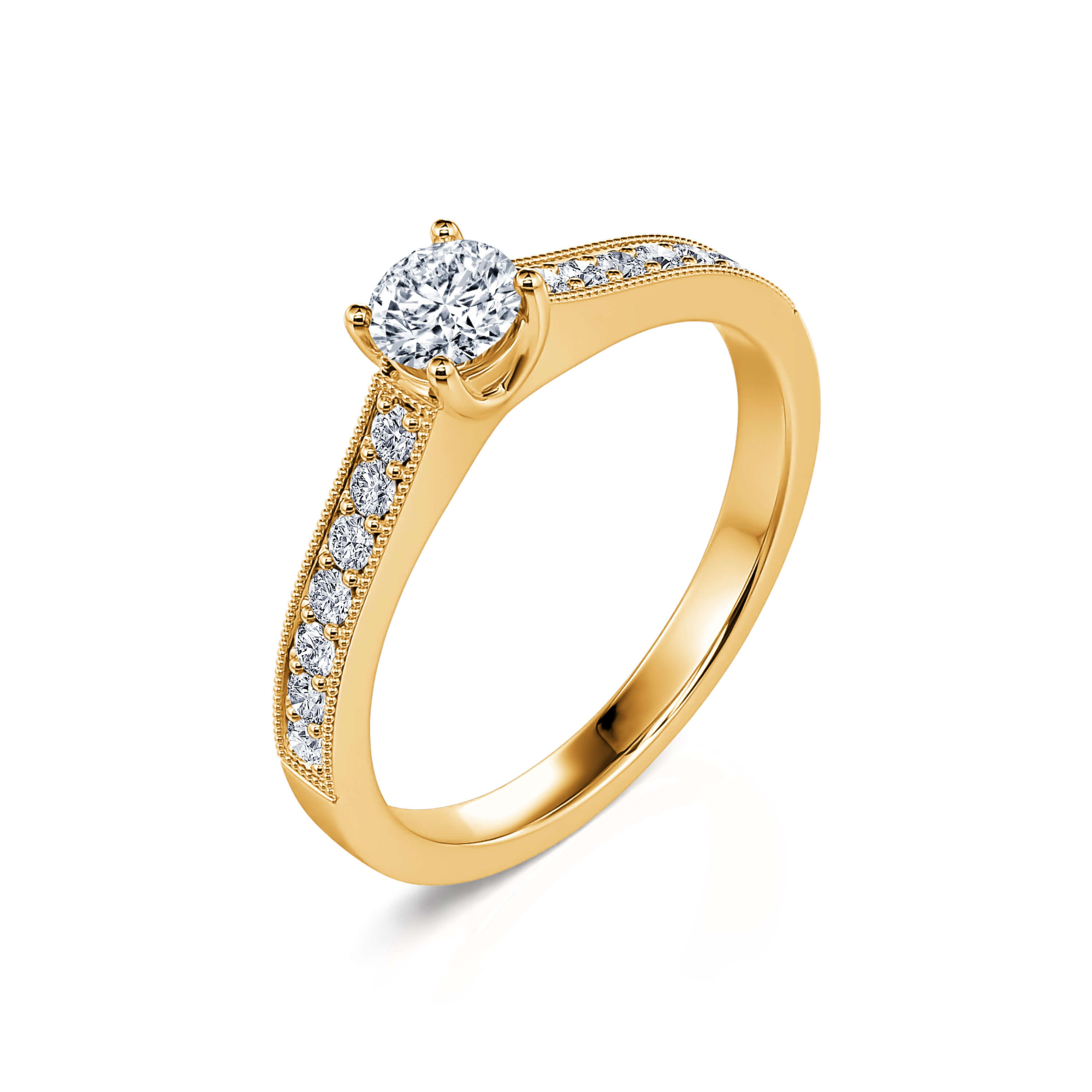 anillo de compromiso en oro y esmeraldas