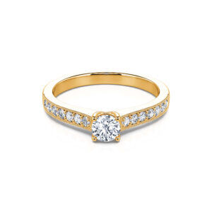 anillo de compromiso en oro y esmeraldas