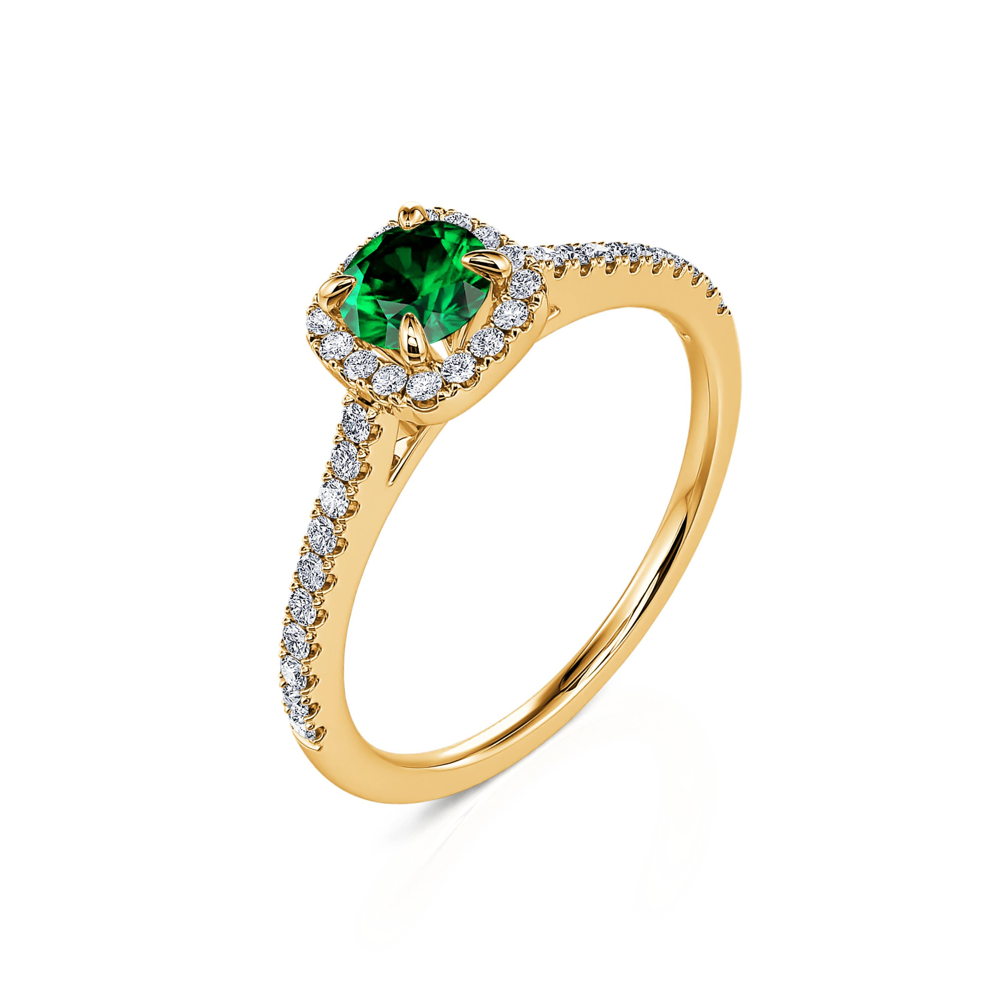 anillos de compromiso con diamantes y esmeraldas